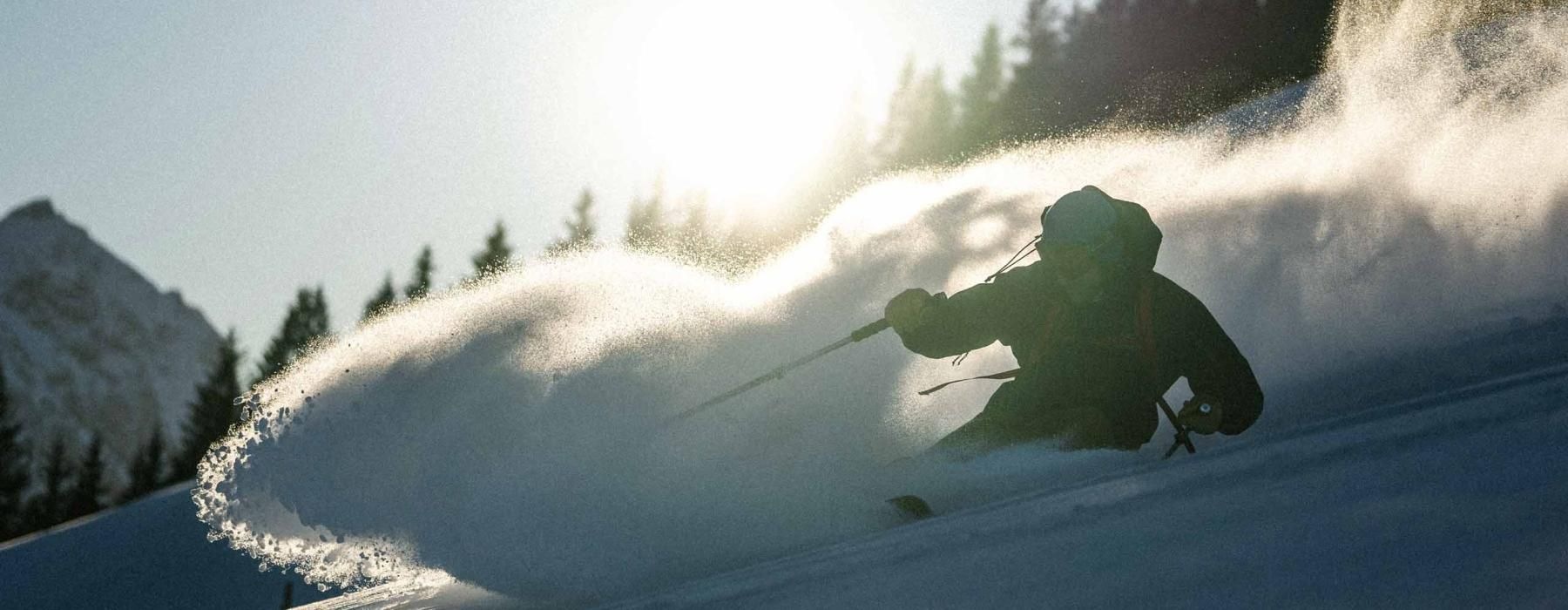 a person skiing down a mountain